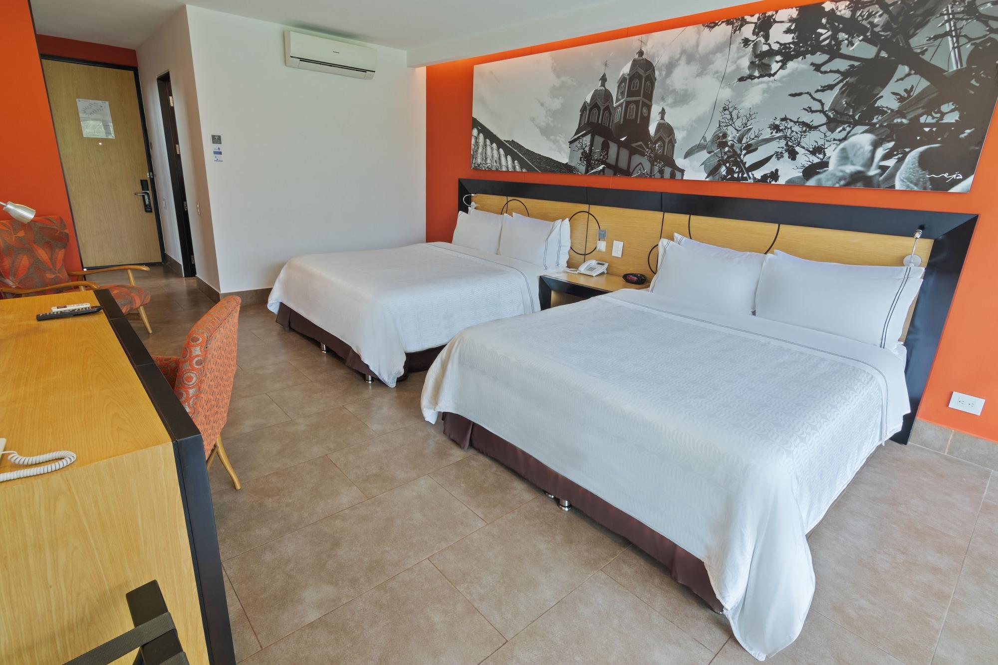 Sonesta Hotel Pereira Cerritos Dış mekan fotoğraf A room at the hotel