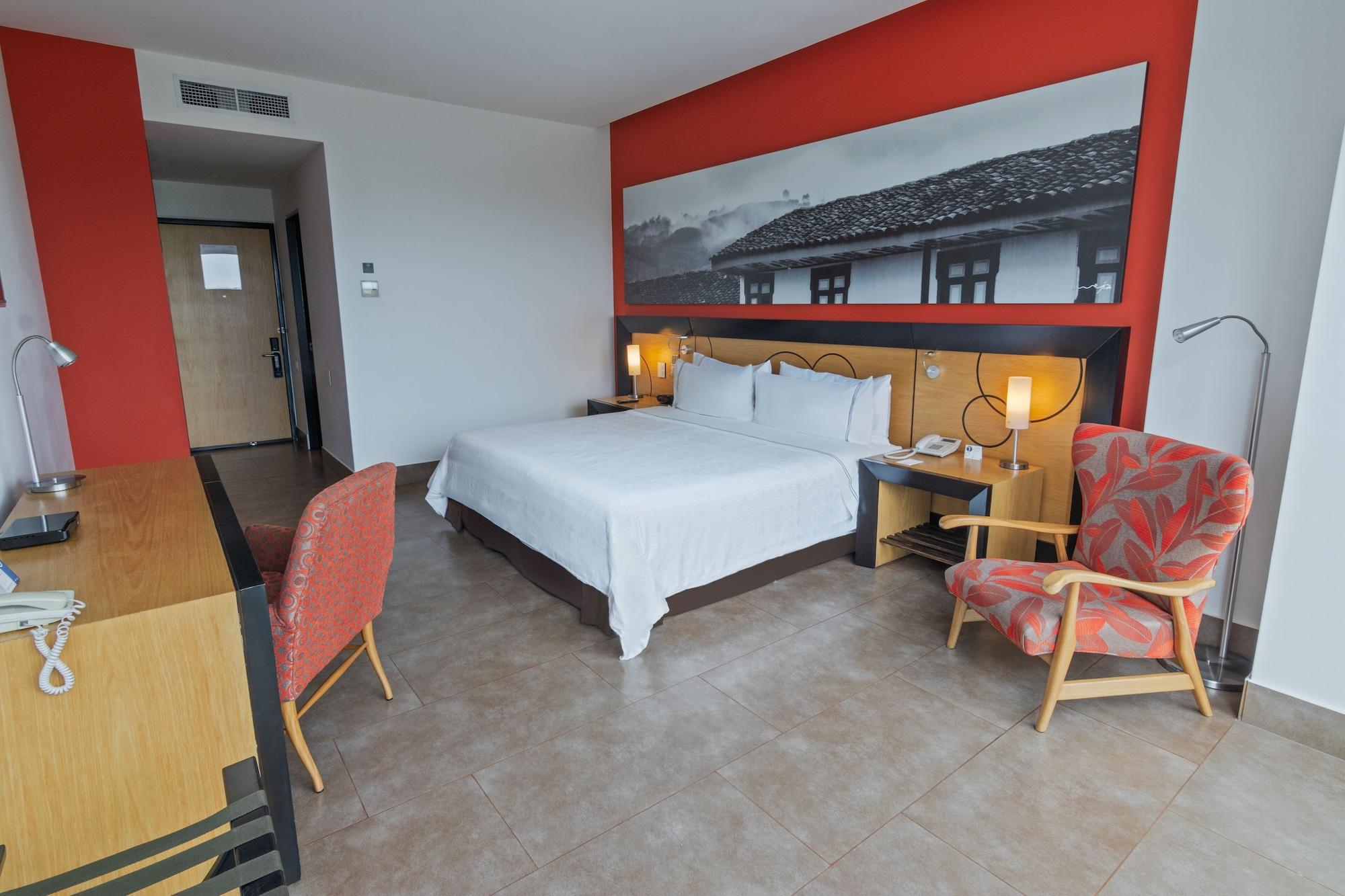 Sonesta Hotel Pereira Cerritos Dış mekan fotoğraf A room at the hotel