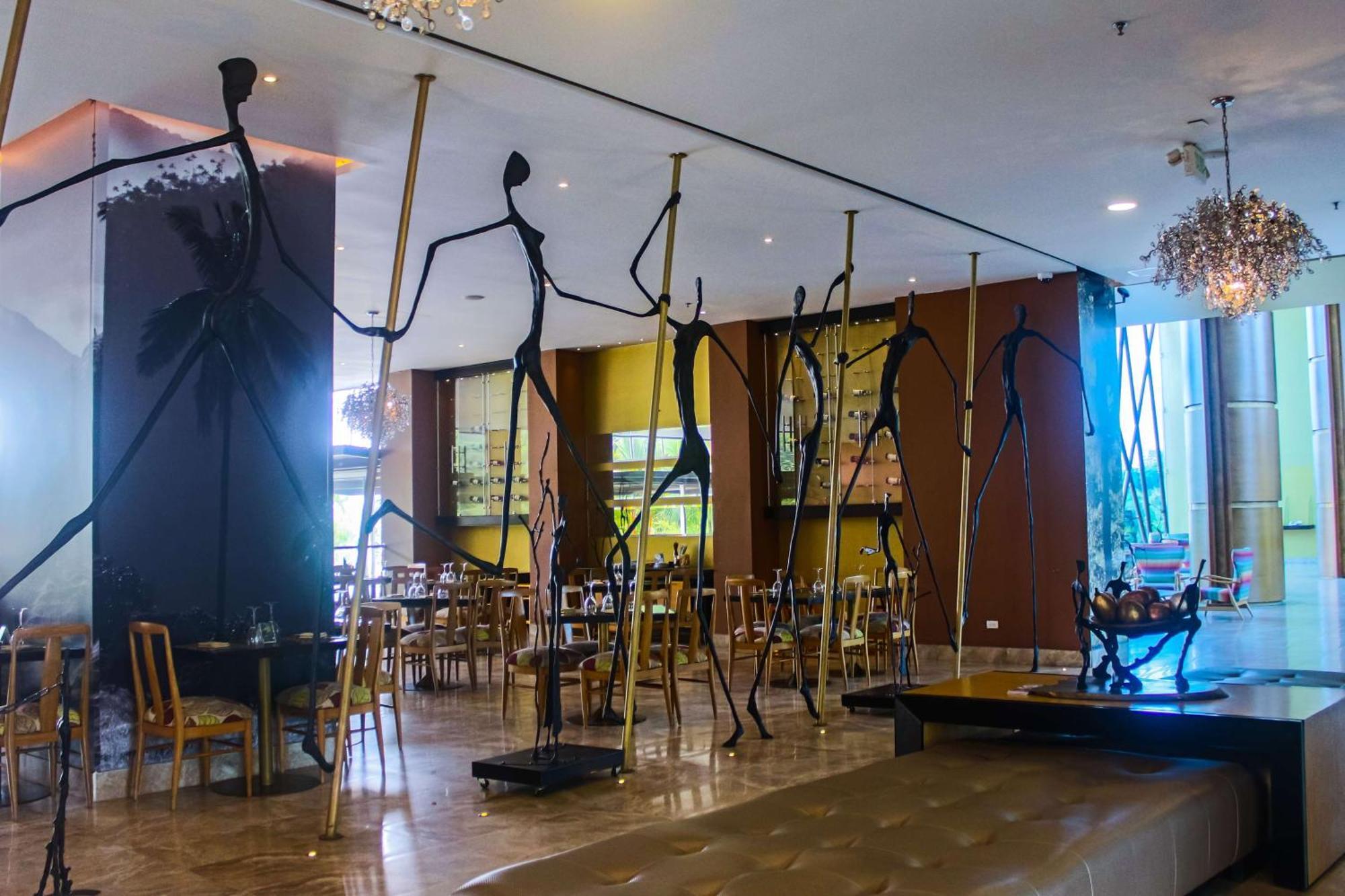 Sonesta Hotel Pereira Cerritos Dış mekan fotoğraf The interior of the restaurant